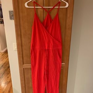 Red jumpsuit. Brand new. Tags still on.